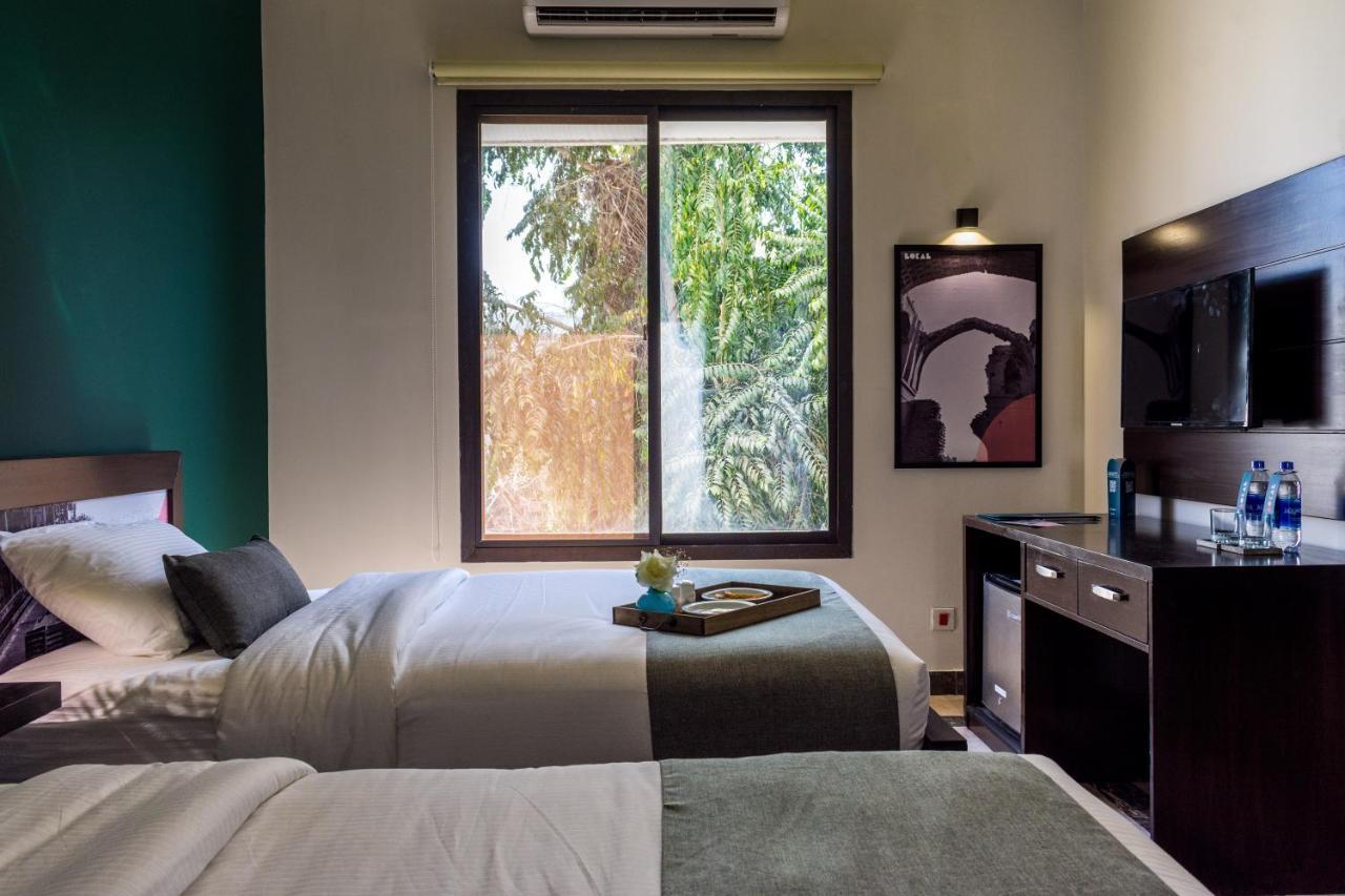 Lokal Rooms X Shahrah-E-Faisal Karachi Exterior foto